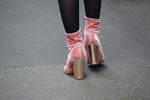 Stylish pink velvet ankle boots perfect for a sustainable fashion wardrobe tips inspired look.