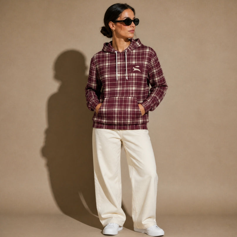 Model wearing the Heritage Tartan Hoodie in Bordeaux in the studio, full-length front view