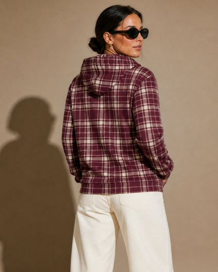 Model wearing the Heritage Tartan Hoodie in Bordeaux, back view with the tartan hood