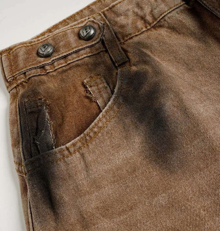 Distressed Patchwork Wide-Leg Denim Pants showing detailed view of pocket and fabric texture.