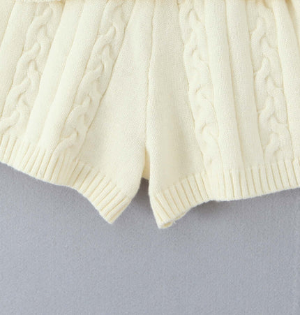 Off-Shoulder Twists Slim Knit Sweater detail showing cable knit texture and design in cream color