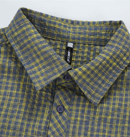 Casual Plaid Shirt – Relaxed Fit, soft cotton blend with a classic flip collar and timeless plaid pattern.