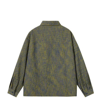 Casual Plaid Shirt – Relaxed Fit, featuring a relaxed silhouette and classic flip collar in a plaid pattern.