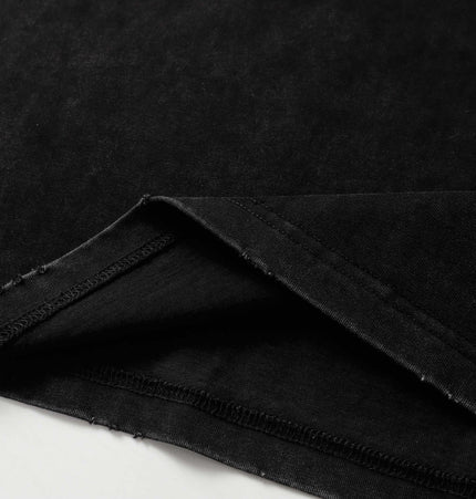 Close-up of the fabric detail for the Washed Spliced Distressed TShirt – Loose Fit, showcasing its quality and texture.