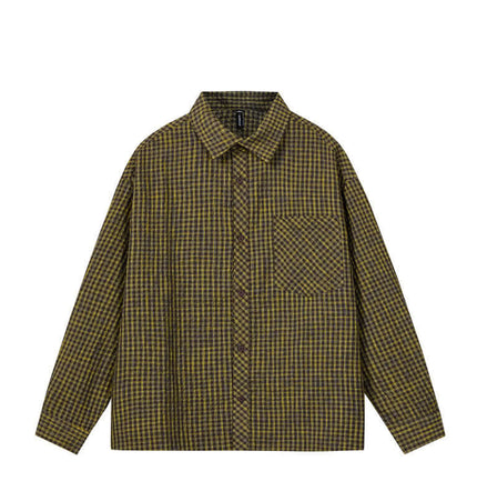 Casual Plaid Shirt – Relaxed Fit featuring a timeless plaid pattern, relaxed silhouette, and classic flip collar.