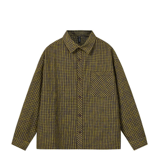 Casual Plaid Shirt – Relaxed Fit featuring a timeless plaid pattern, relaxed silhouette, and classic flip collar.