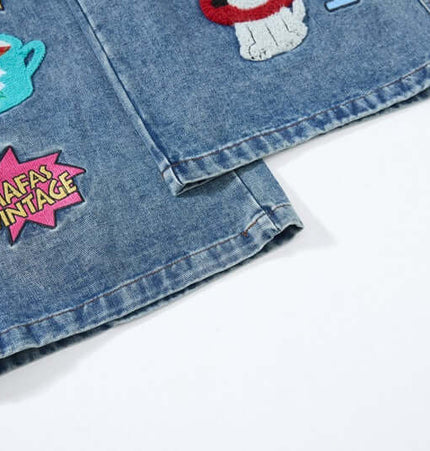Cartoon Patch College Denim Pants showcasing colorful embroidered patches on durable denim fabric.