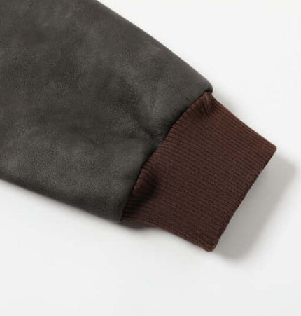 Close-up of the sleeve cuff of a Thick Suede Hooded Jacket – Street Style, showcasing premium faux suede and ribbed fabric.