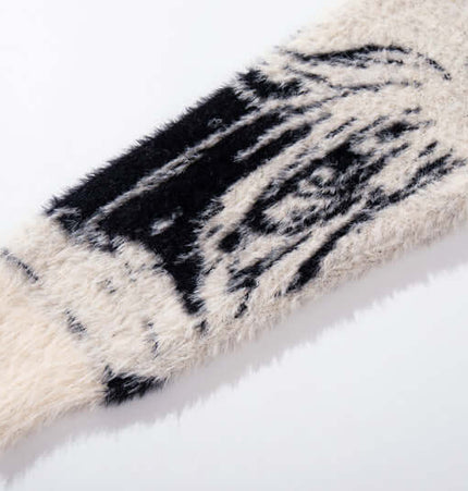 Floral Jacquard Knit Cardigan – Loose Fit with a cozy black and cream floral pattern sleeve detail