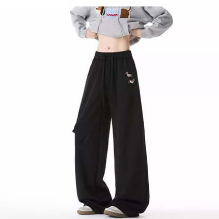 Dog Embroidered Sweatpants - Loose Fit model showcasing relaxed style and vintage dog embroidery detail