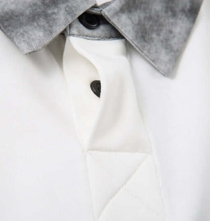 Close-up of the Retro Embroidered Patchwork Polo Hoodie showcasing its unique collar and button details.