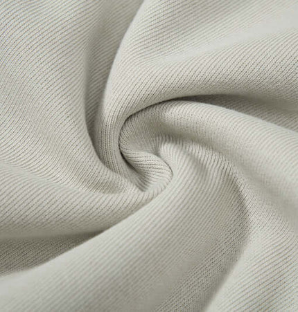 Close-up of soft fabric texture for Color-Block Hooded Jacket – Loose Fit, showcasing quality cotton material.