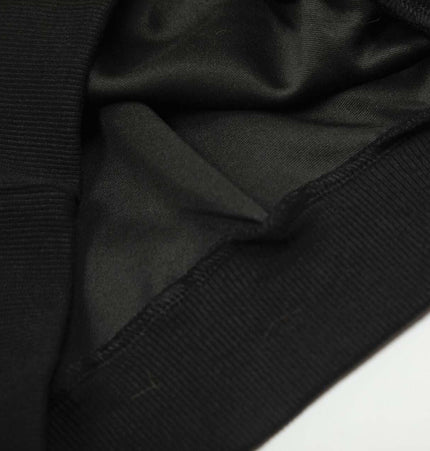 Close-up view of the fabric and stitching details of the Retro Dachshund Hoodie - Loose Fit.