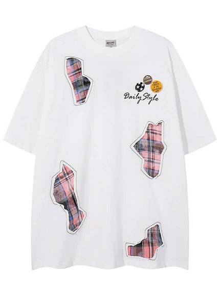 Close-up of Black applique badge graphic tee fabric