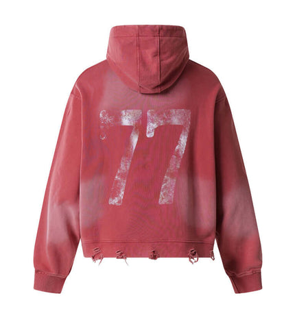 Washed Rhinestone Letter Hoodie – Loose Fit in faded red with distressed hem and large rhinestone number 77 on the back.