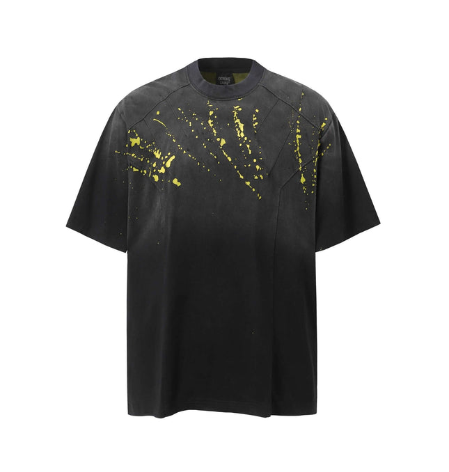 Retro Splatter Print TShirt – Loose Fit with high-street energy and bold yellow splatter design on a black background.