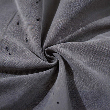 Close-up of the fabric texture showcasing distressed detail for Patchwork Distressed Knife Pants.