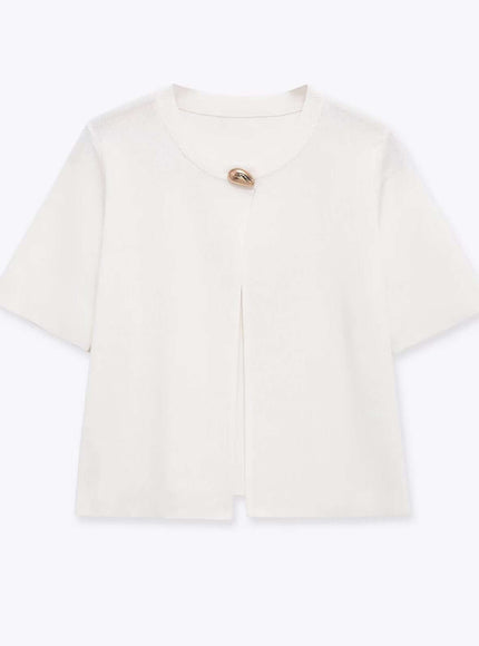 Close-up of White round neck simple knitted fabric