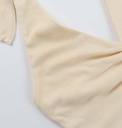 Split Neck Suspender Top – Slim Fit in smooth beige fabric, showcasing its sleek design and comfortable texture.