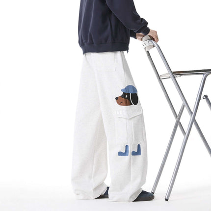 Embroidered Dog Sweatpants – Loose Fit featuring playful dog embroidery on a relaxed streetwear style.