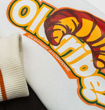 Close-up of vibrant print on the Color-Block Baseball Jacket – Loose Fit with bold graphics and ribbed cuffs.