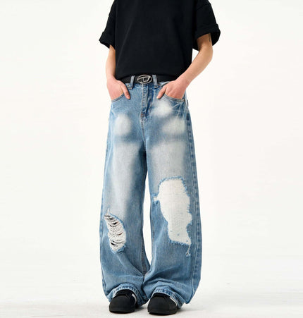 Casual Ripped Light Blue Jeans – Loose Fit displayed on a model with a relaxed fit and ripped detailing.