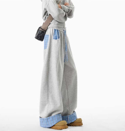 Loose Wide-Leg Sweatpants with blue checkered pockets and relaxed fit, styled for autumn streetwear.