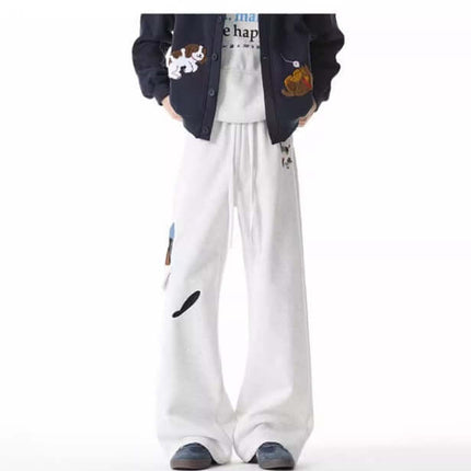 Dog Embroidered Sweatpants - Loose Fit worn with a playful vintage cardigan, showcasing a relaxed style.