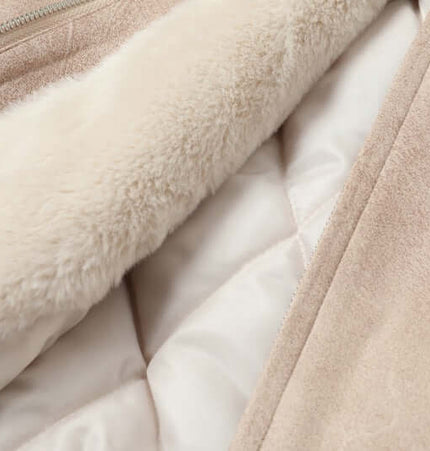 Faux Fur Hooded Jacket – Street Style interior detail showcasing soft faux fur lining and quilted fabric.