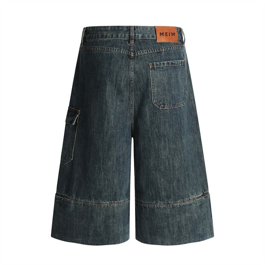 Blue washed distressed denim 7/8 pants with Grozavu logo