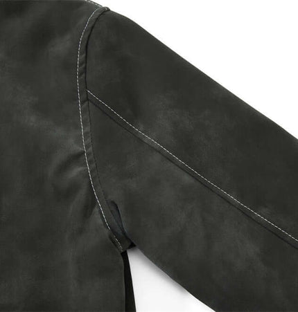 Close-up view of the sleeve and stitching on the Street Style Cotton Jacket – Loose Fit in dark color.