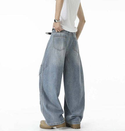 Knife-Cut Cargo Pants – Loose Fit, showcasing a relaxed silhouette and distressed denim design.