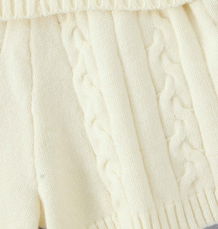Casual Slim Fit Patterned Wool Shorts in soft cream color with cable knit design and ribbed waistband.
