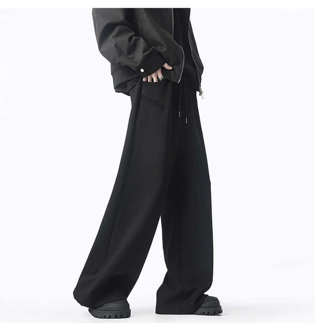 Model wearing Oversized Winter Casual Long Pants in black, showcasing street style and winter comfort.