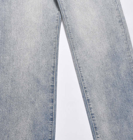 Washed Micro Flared Jeans – Loose Fit showcasing vintage washed blue denim with straight legs and subtle micro flare.
