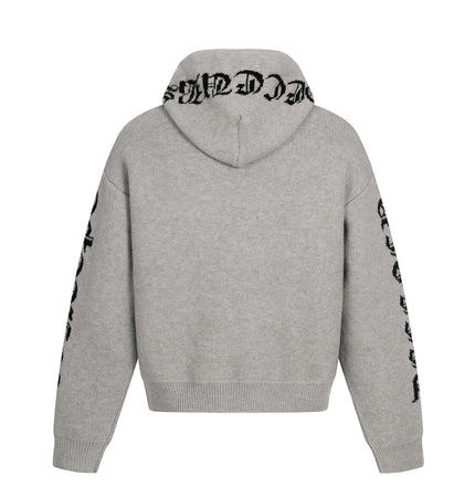 Back view of Letter Jacquard Knit Hoodie – Loose Fit in soft gray with bold jacquard pattern on sleeves.