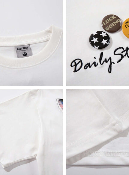 Black applique badge graphic tee with Grozavu logo