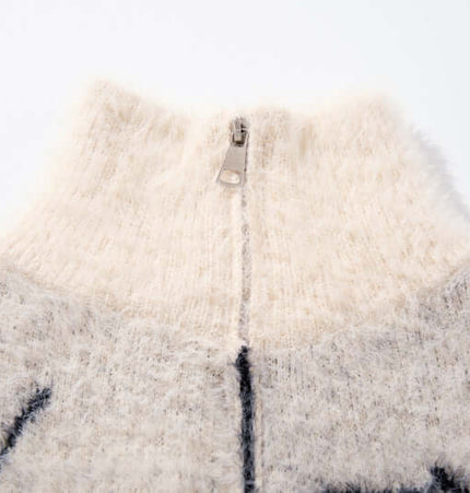 Close-up of the neck detail and zipper of the Casual Butterfly Spider Jacquard Cardigan.