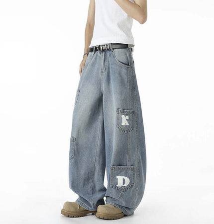 Knife-Cut Cargo Pants – Loose Fit showcased on a model, featuring a relaxed style with distinct patch detailing.