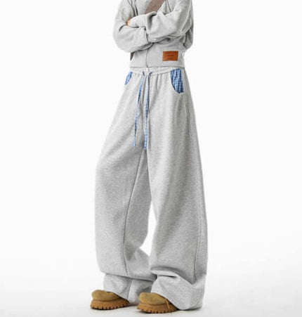 Loose Wide-Leg Sweatpants in gray with adjustable drawstring and wide-leg design, perfect for relaxed comfort.