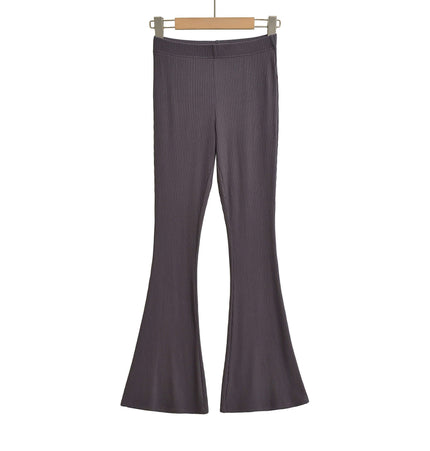 Slim Fit Low Waist Slightly Flared Pants in ribbed fabric, featuring a stylish flare hem for a modern silhouette.