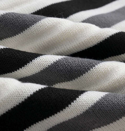 Color-Block Letter Knit Sweater - Loose Fit featuring bold black and white striped knit fabric.