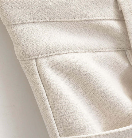 Detail of High Elastic Micro Flare Casual Pants showing smooth fabric and stylish design.