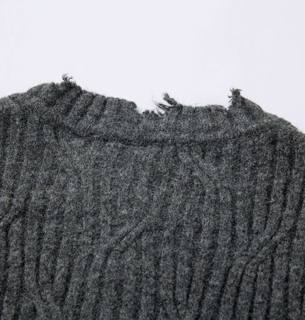 Ripped Hem Knit Cardigan – Loose Fit showcasing a distressed neckline detail and textured fabric.