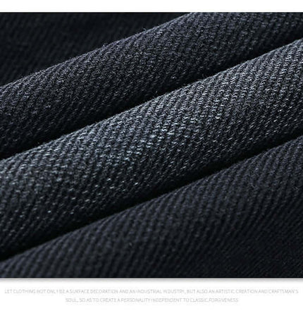 Close-up of water-washed cotton denim fabric featuring texture for Straight Loose Fit Denim Jeans.
