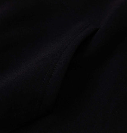 Cross Embroidered Hoodie – Loose Fit close-up fabric detail showcasing soft texture and quality stitching.