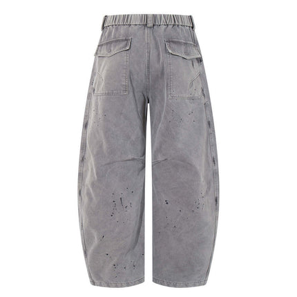 Back view of Patchwork Distressed Knife Pants with cargo pockets and a rugged, distressed finish.