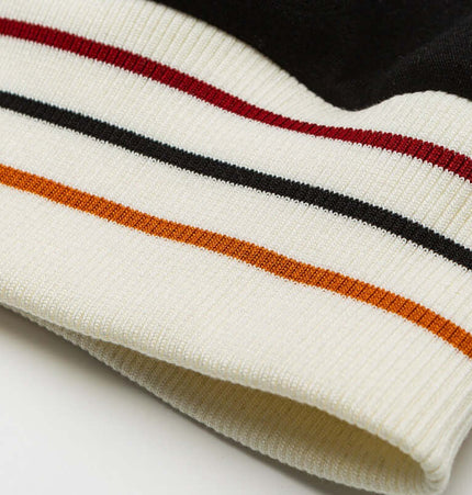 Color-Block Baseball Jacket – Loose Fit featuring vibrant striped details on the sleeve.