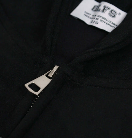 Faux Suede Printed Hoodie – Loose Fit close-up view showing the zipper and fabric details.