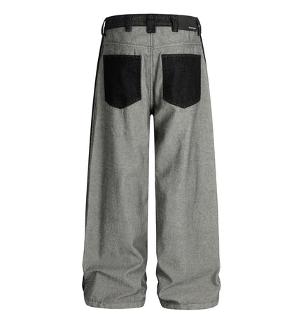 Back view of Printed Deconstructed Asymmetrical Jeans showcasing unique fabric panels and wide-leg design.